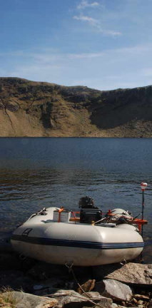 Boat prepared for lake bathymetry survey in remote mountain location
